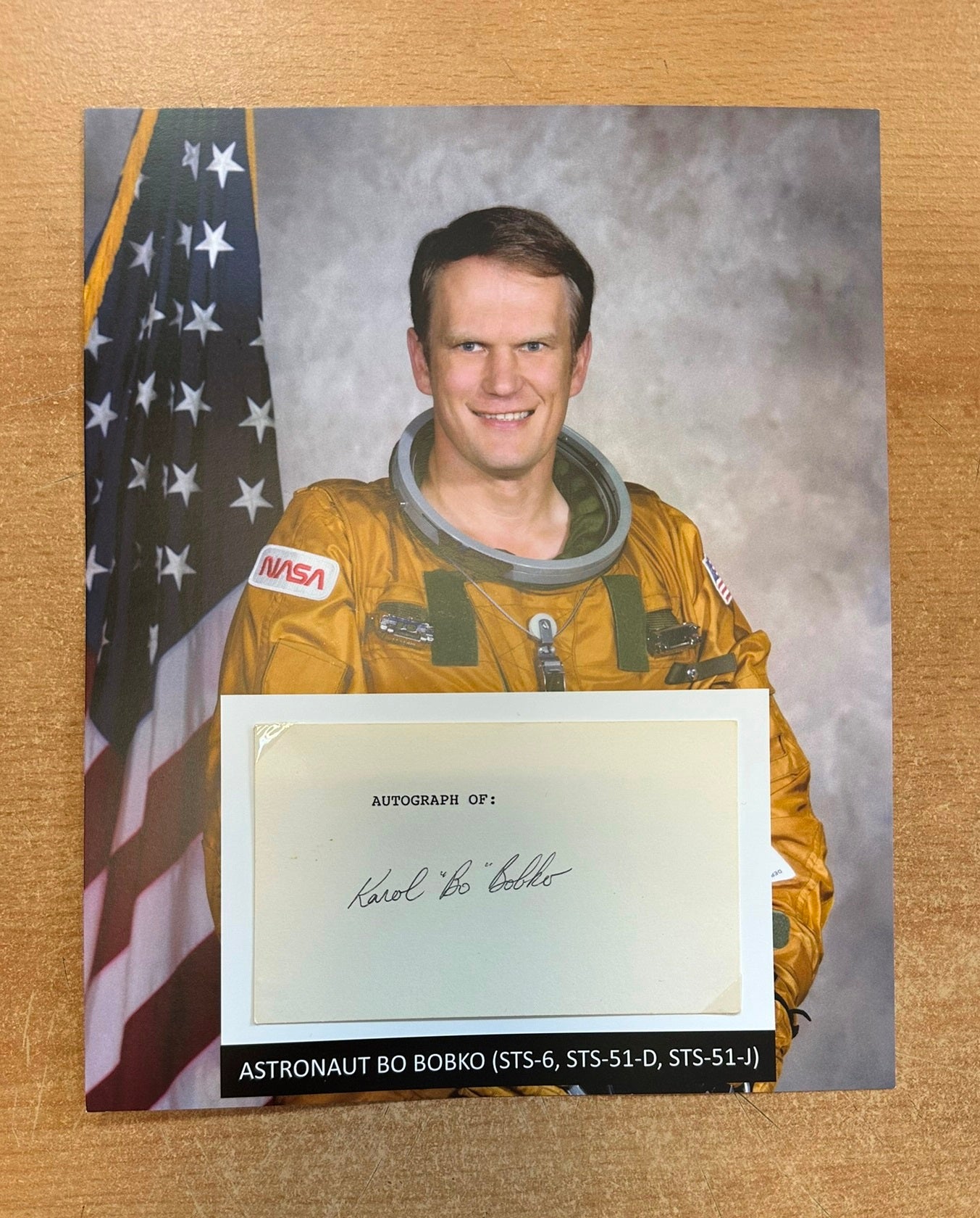 Astronaut Bo Bobko hand-signed 5x3'' index card on 8x10'' presentation