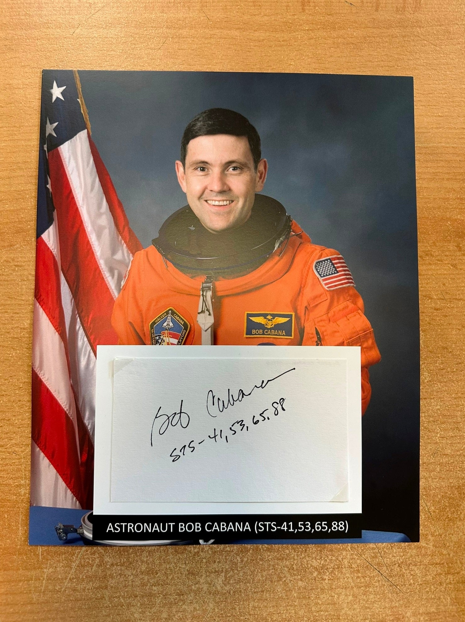 Astronaut Bob Cabana hand-signed 5x3'' index card on 8x10'' presentation