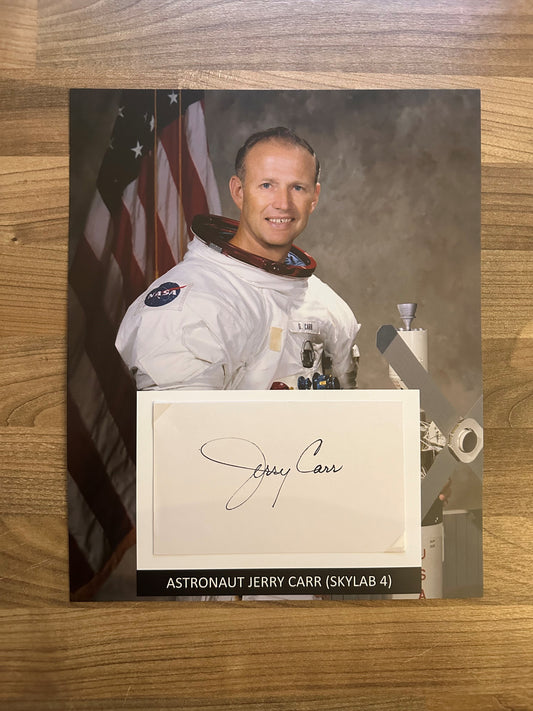 Astronaut Jerry Carr hand-signed 5x3'' index card on 8x10'' presentation