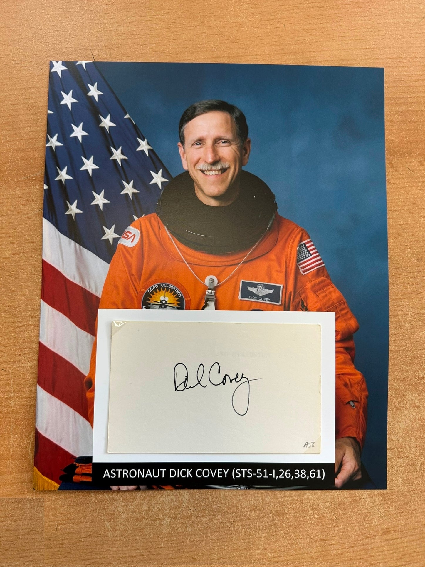 Astronaut Dick Covey hand-signed 5x3'' index card on 8x10'' presentation