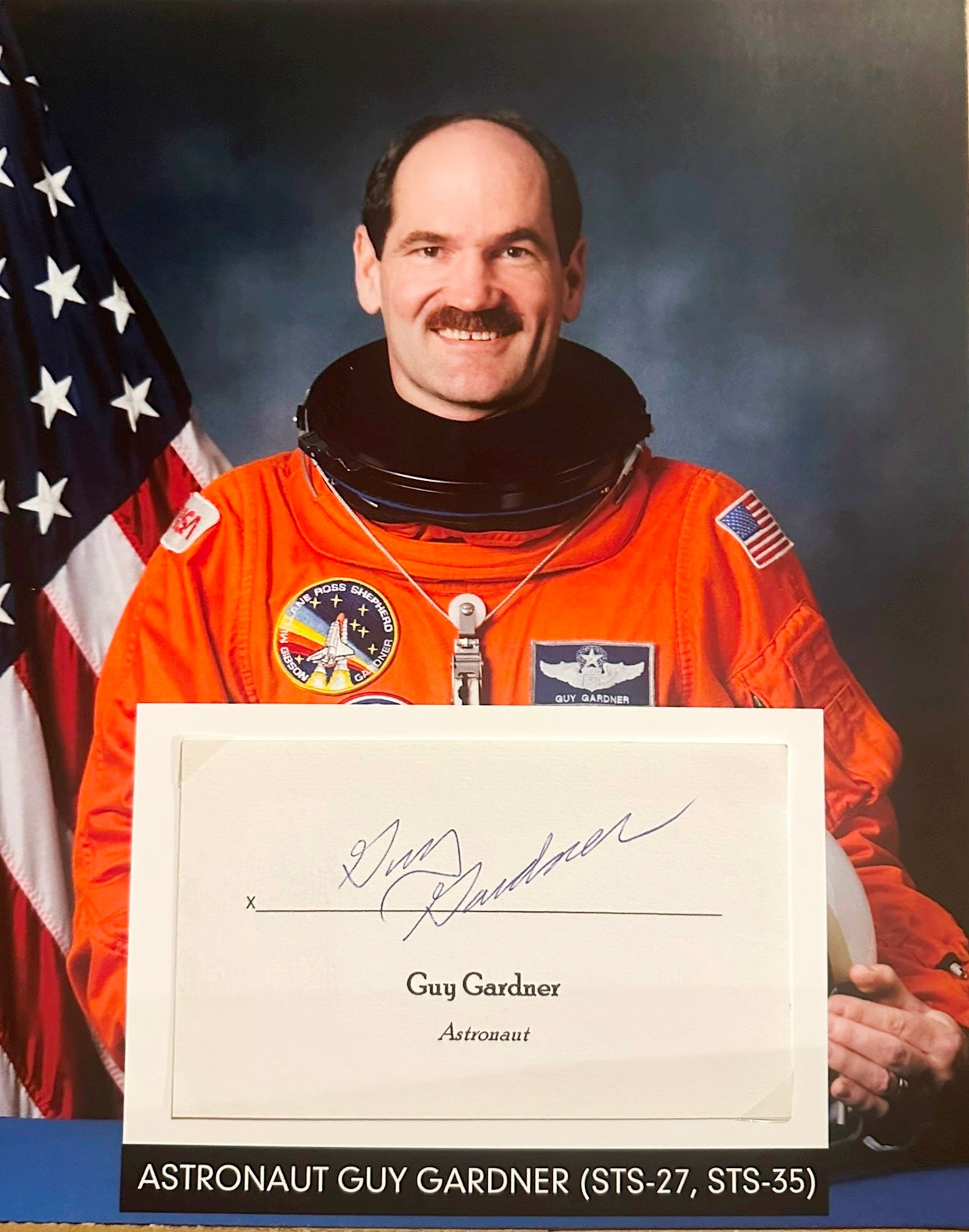 Astronaut Guy Gardner hand-signed 5x3'' index card on 8x10'' presentation