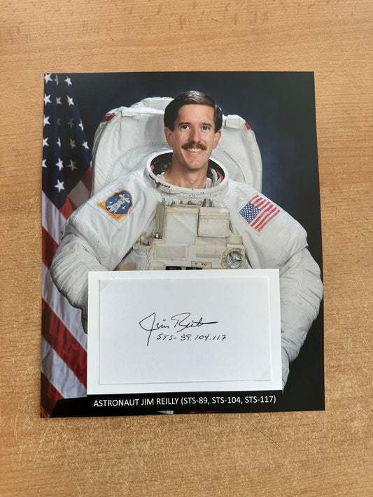 Astronaut Jim Reilly hand-signed 5x3'' index card on 8x10'' presentation