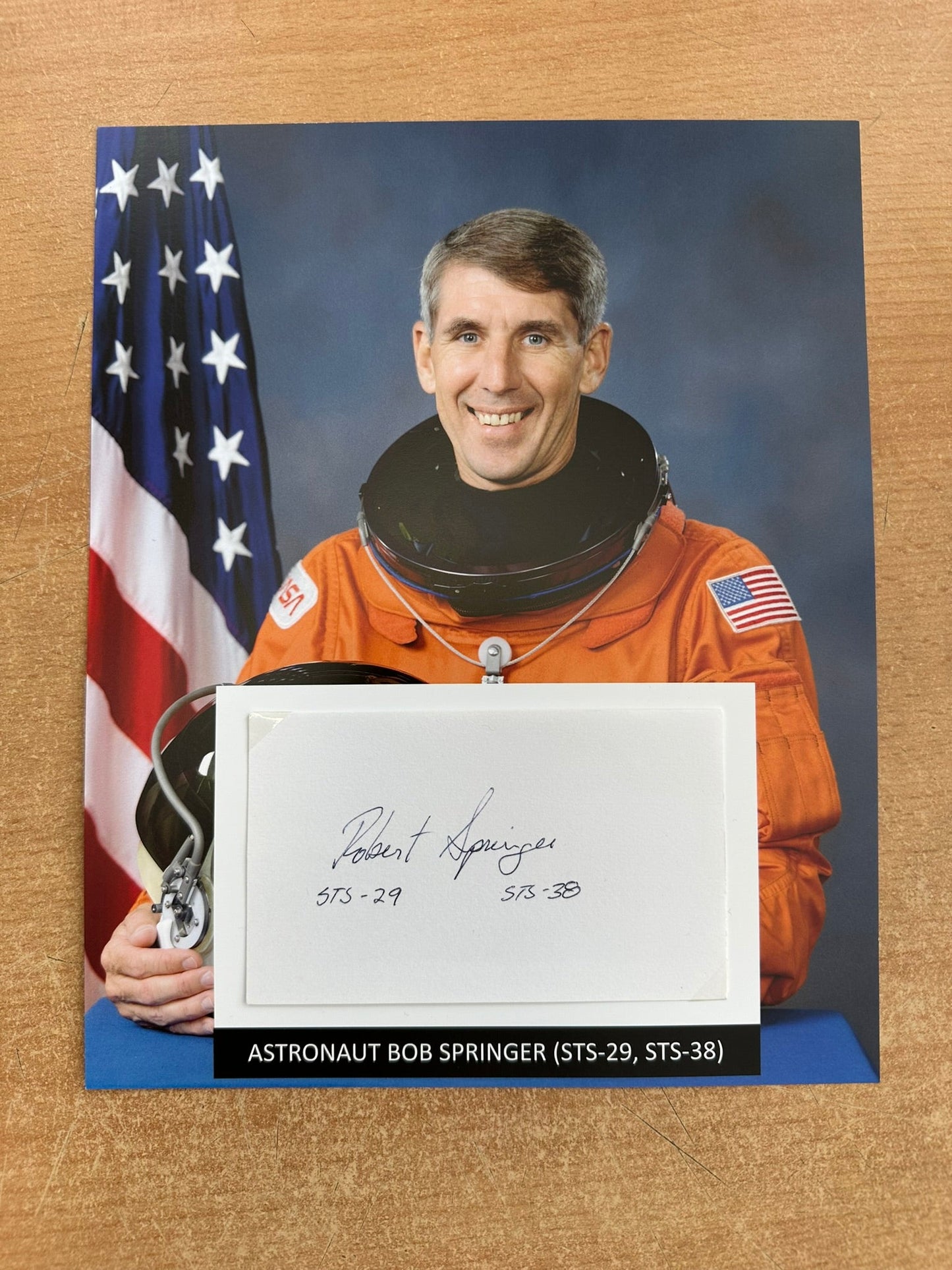 Astronaut Bob Springer hand-signed 5x3'' index card on 8x10'' presentation